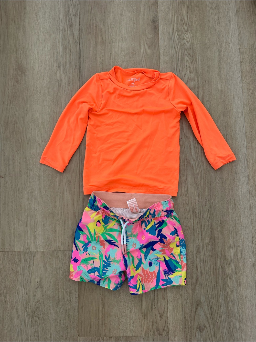 Bright Orange Long Sleeve Rash Guard with Neon Floral Swim Shorts